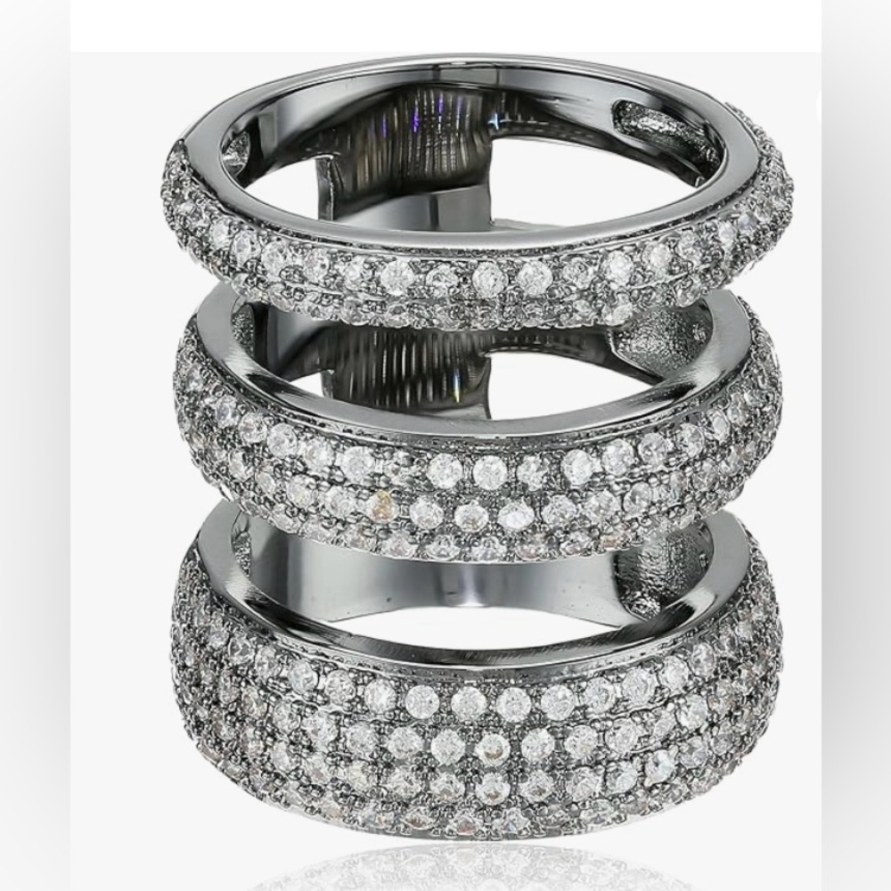 NWT NOIR 3 ROW RING
Designed with clear pave cz stones and brass plated gunmetal